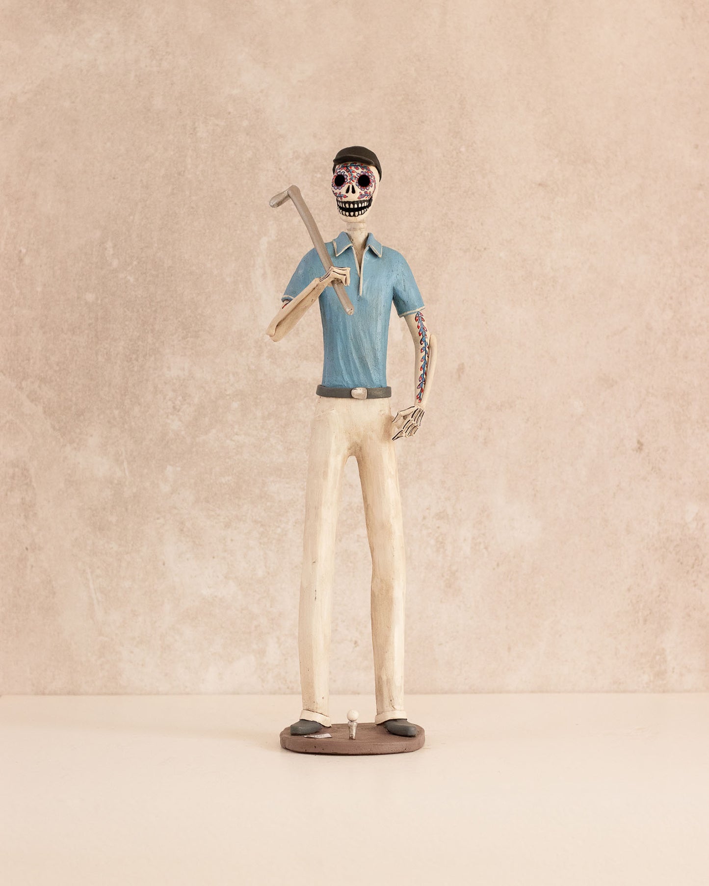 Catrina "Golfer blue shirt"