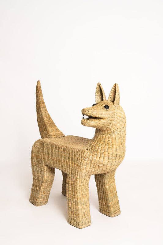 Coyote Sculpture made with natural fibers with an iron base