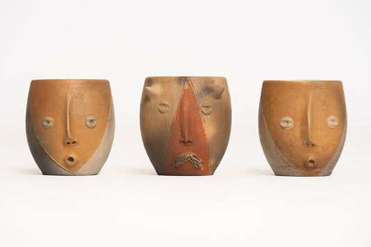 Clay Shot Glasses face design